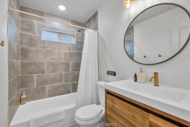 bathroom featuring toilet, vanity, and shower / bathtub combination with curtain