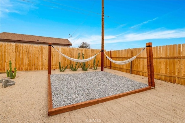 6566 El Rey Ave Unit 29, Palms, CA 92277 - exterior space featuring a fenced backyard