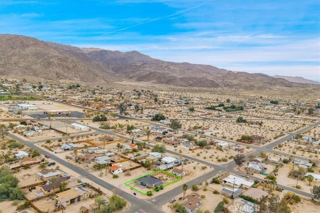 6566 El Rey Ave Unit 29, Palms, CA 92277 - birds eye view of property featuring a mountain view and view of desert