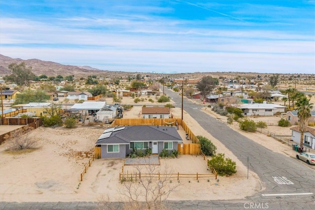 bird's eye view with a residential view and a mountain view