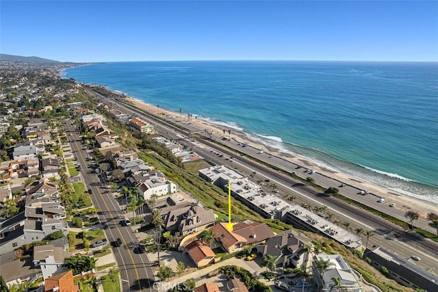 birds eye view of property with a residential view, a view of the beach, and a water view