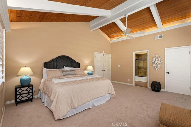 bedroom featuring visible vents, wooden ceiling, baseboards, light colored carpet, and vaulted ceiling with beams