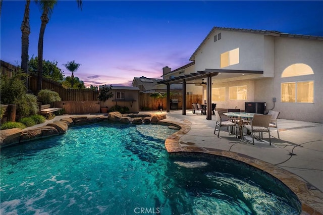 view of pool featuring a fenced in pool, a hot tub, central AC unit, a fenced backyard, and a patio