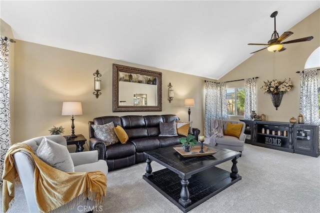 living room featuring carpet flooring, lofted ceiling, and a ceiling fan