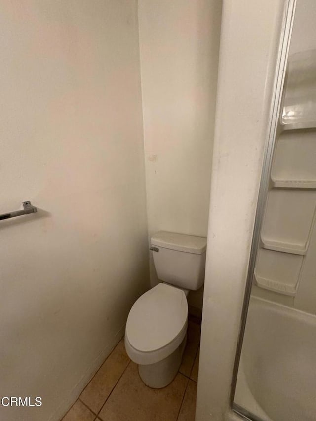 3700 Dean Dr Unit 3405, Ventura, CA 93003 - full bath with tile patterned floors, baseboards, toilet, and a shower stall