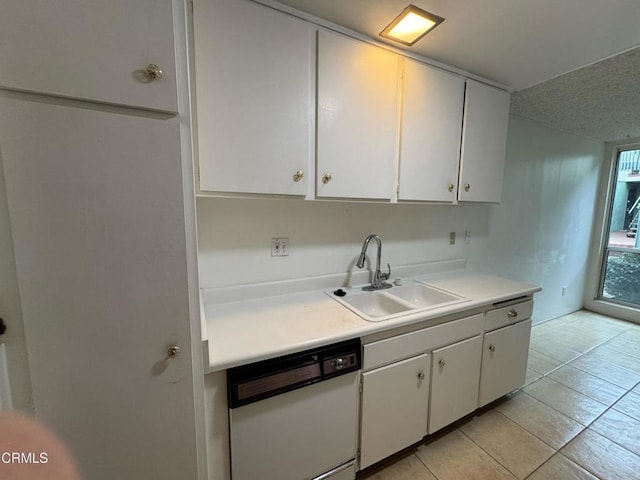 3700 Dean Dr Unit 3405, Ventura, CA 93003 - kitchen with a sink, white cabinets, white dishwasher, light countertops, and light tile patterned floors