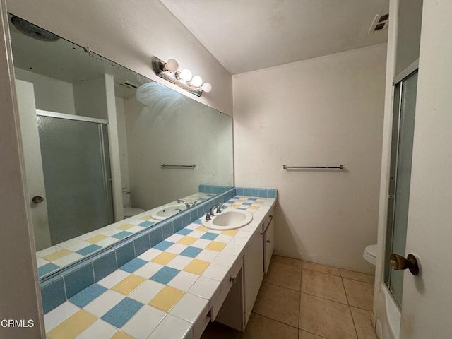 3700 Dean Dr Unit 3405, Ventura, CA 93003 - full bathroom featuring visible vents, toilet, an enclosed shower, and tile patterned flooring