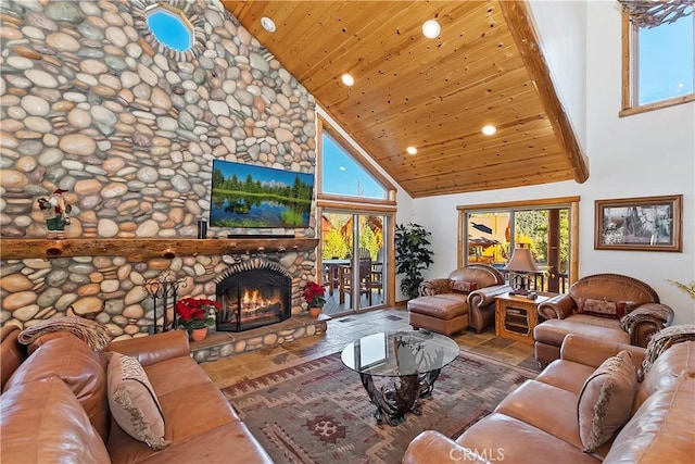 living area featuring recessed lighting, high vaulted ceiling, a stone fireplace, and wooden ceiling