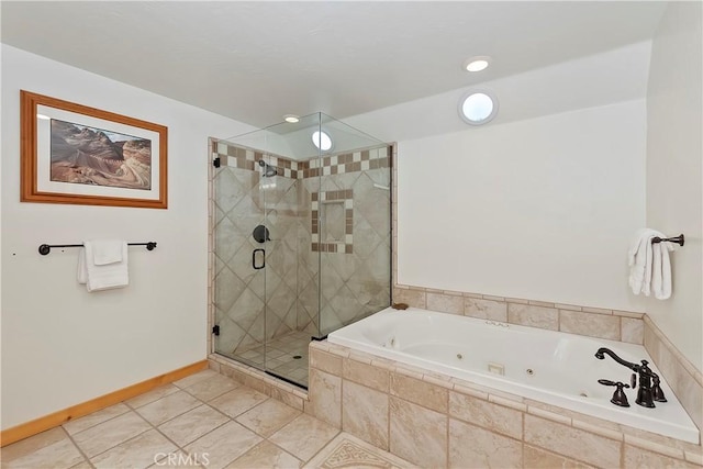 full bathroom with tile patterned floors, baseboards, a jetted tub, and a shower stall