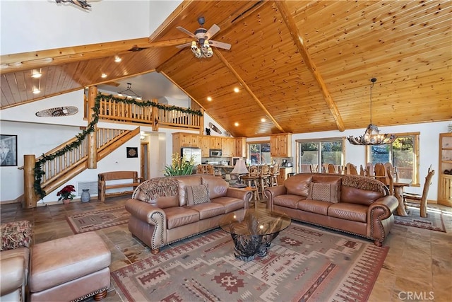 living area featuring stairs, wooden ceiling, high vaulted ceiling, and beam ceiling