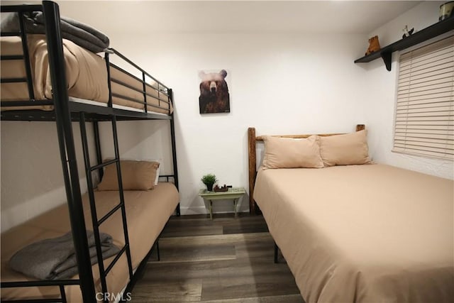 bedroom with wood finished floors