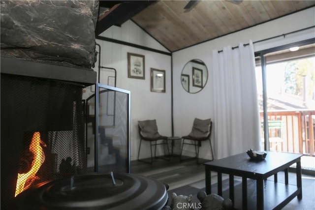 interior space featuring vaulted ceiling and wood ceiling