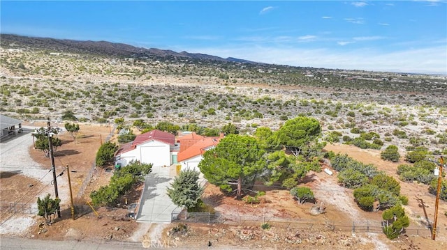 drone / aerial view with a mountain view and a desert view