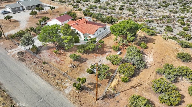 aerial view featuring a desert view