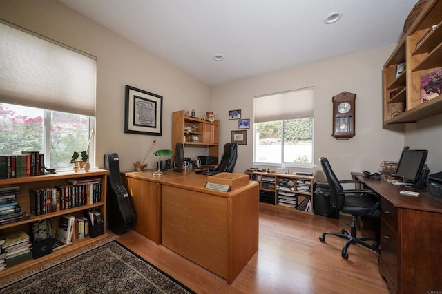 home office with recessed lighting and wood finished floors