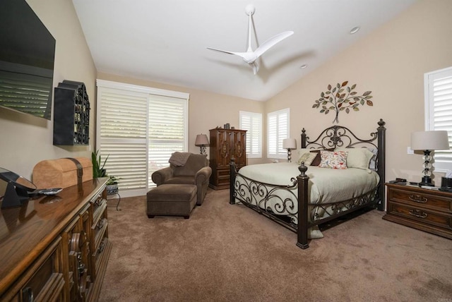 bedroom featuring ceiling fan, carpet, and vaulted ceiling