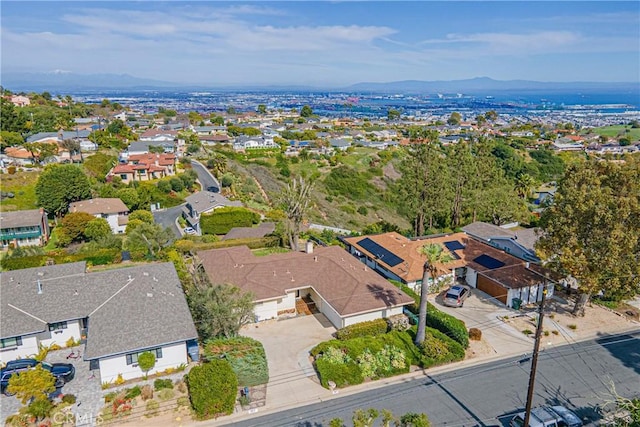 bird's eye view with a residential view and a mountain view