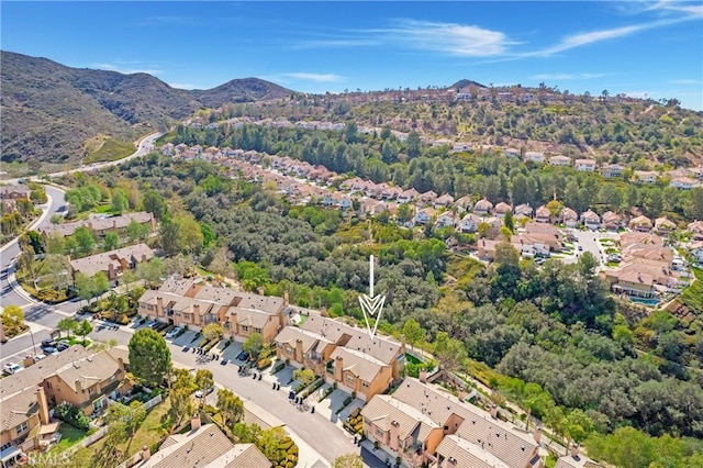 drone / aerial view featuring a mountain view and a residential view