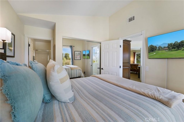 bedroom featuring visible vents and vaulted ceiling