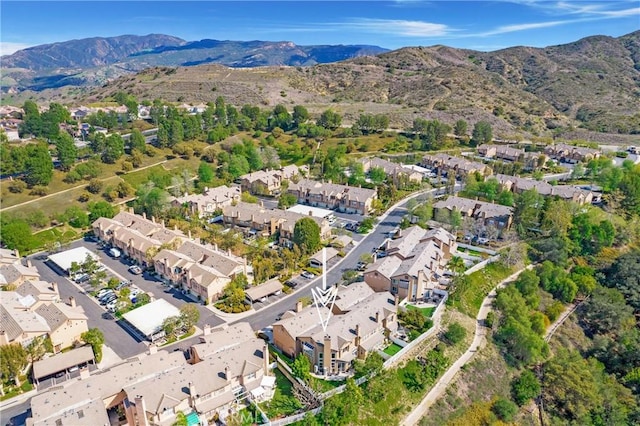 birds eye view of property featuring a residential view and a mountain view