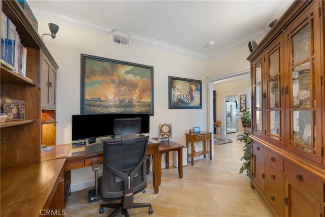 office space with baseboards, visible vents, and ornamental molding