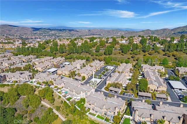 aerial view featuring a mountain view and a residential view