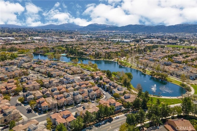 aerial view with a residential view and a water and mountain view