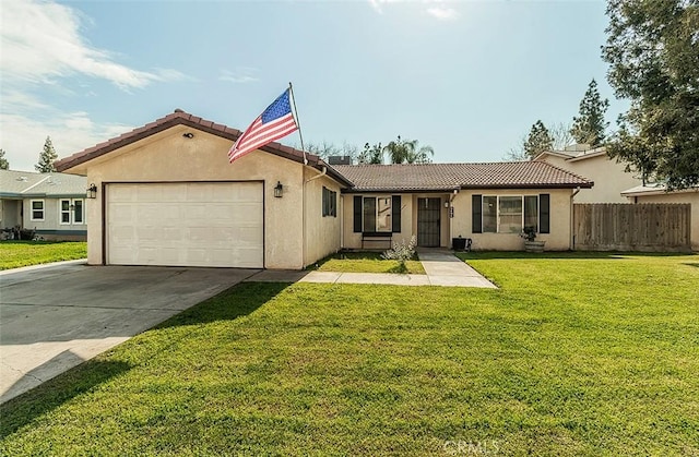 view of front of home featuring a front yard, fence, an attached garage, stucco siding, and a tile roof