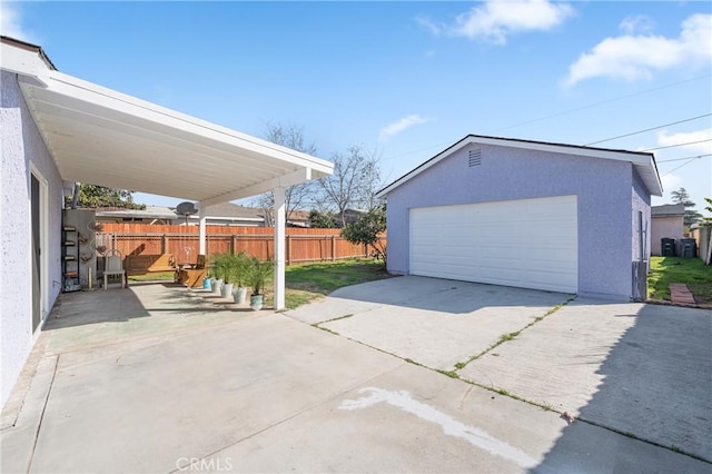 detached garage with fence