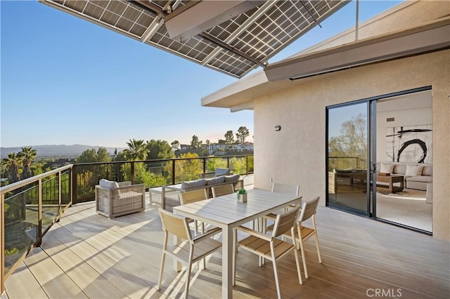 exterior space with outdoor lounge area and outdoor dining area