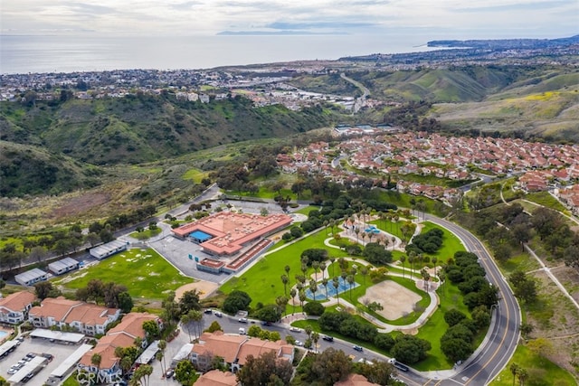 birds eye view of property with a residential view