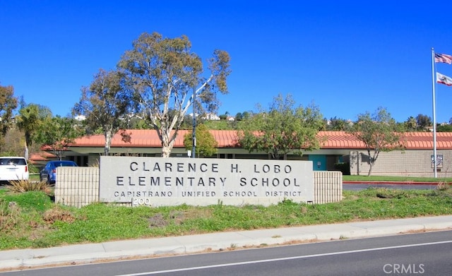 view of community sign