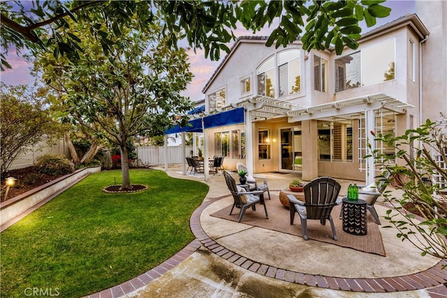 view of yard with a patio area, a pergola, and a fenced backyard