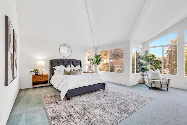 bedroom featuring carpet and lofted ceiling