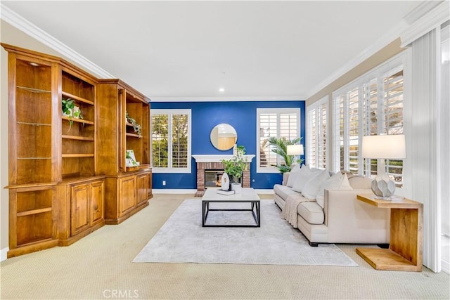 living room featuring plenty of natural light, light colored carpet, ornamental molding, and a fireplace