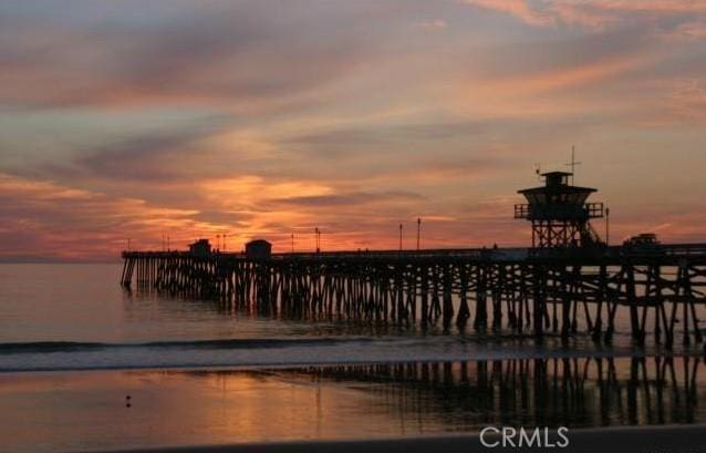 property view of water featuring a pier