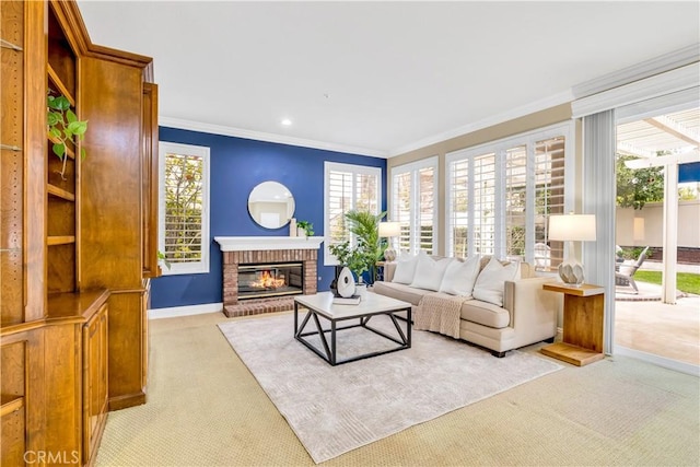 living room featuring a brick fireplace, plenty of natural light, baseboards, and ornamental molding