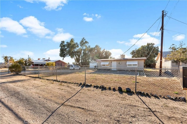 single story home with fence