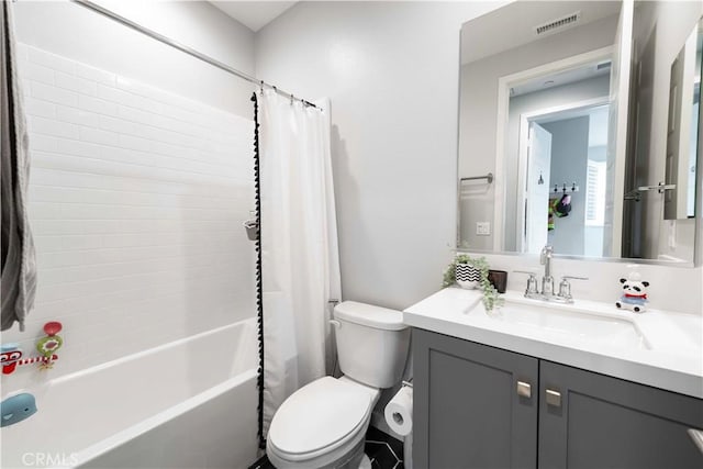 full bath with vanity, toilet, shower / bath combo, and visible vents