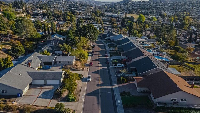 aerial view with a mountain view and a residential view