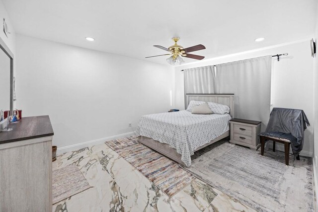 bedroom with a ceiling fan, recessed lighting, and baseboards