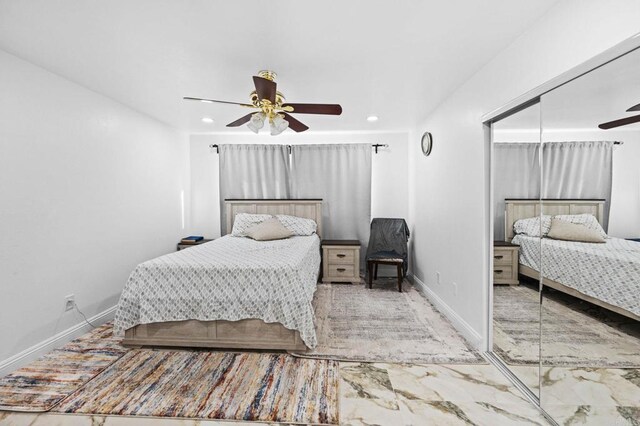 bedroom with recessed lighting, a ceiling fan, and baseboards