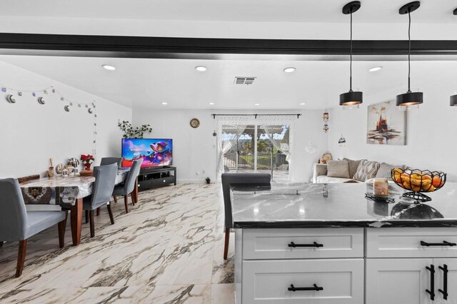 kitchen with visible vents, marble finish floor, open floor plan, white cabinetry, and recessed lighting