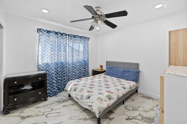 bedroom with a ceiling fan, recessed lighting, and marble finish floor