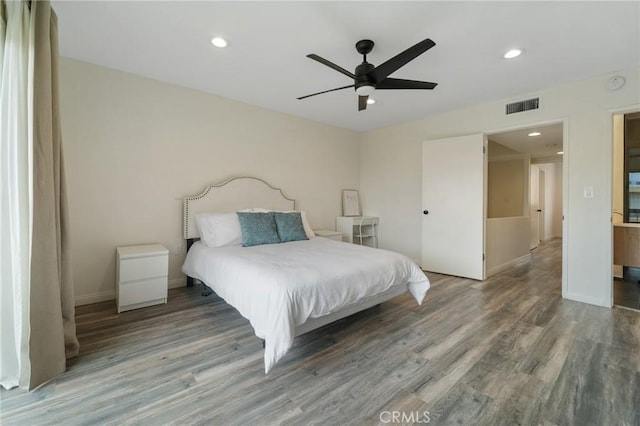 bedroom featuring visible vents, ceiling fan, baseboards, recessed lighting, and wood finished floors