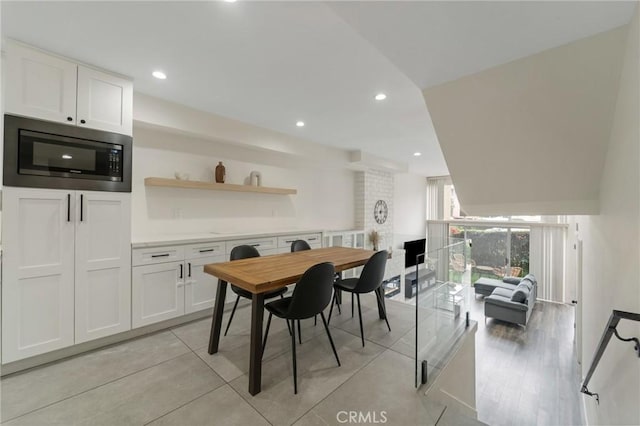 dining space with recessed lighting