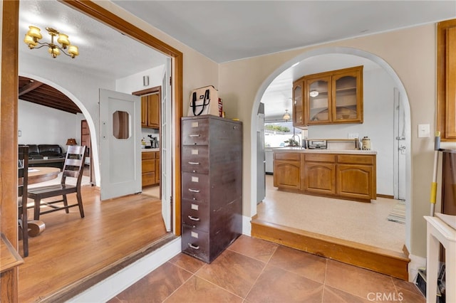 interior space featuring a sink and arched walkways