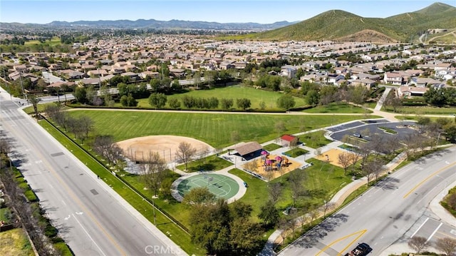 bird's eye view featuring a mountain view and a residential view