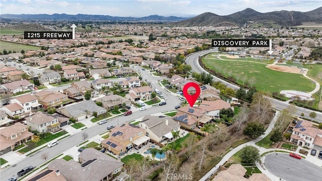 aerial view with a mountain view and a residential view