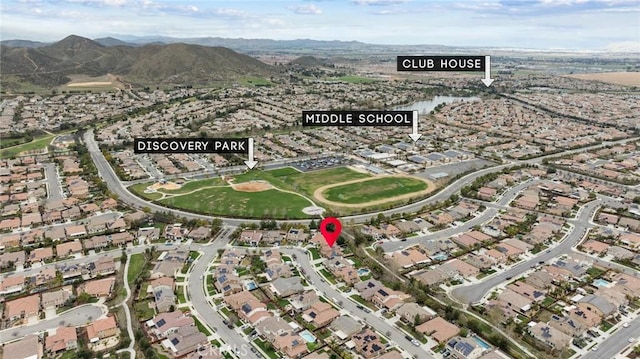 bird's eye view with a mountain view and a residential view